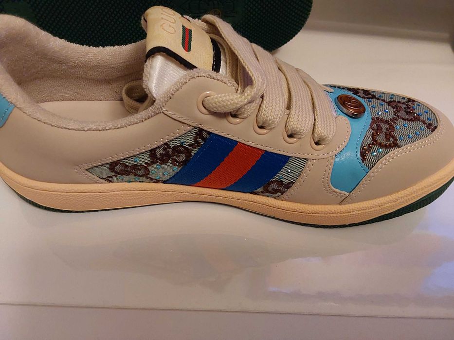 Sapatilhas Gucci.