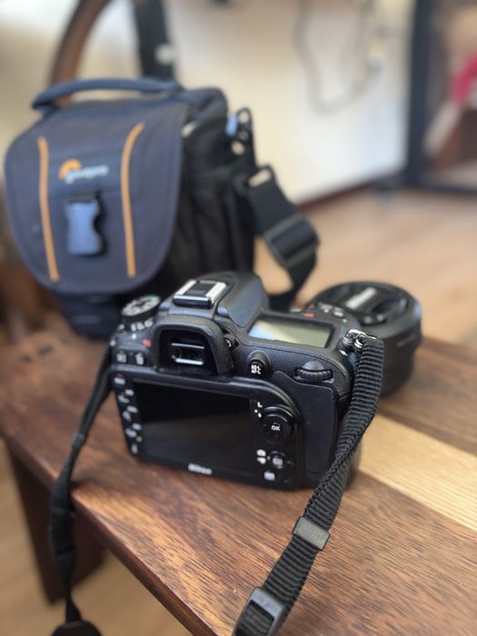 Camera Nikon D7100 + Objetiva Nikon AF-S DX Nikkor 35mm plus bolsa