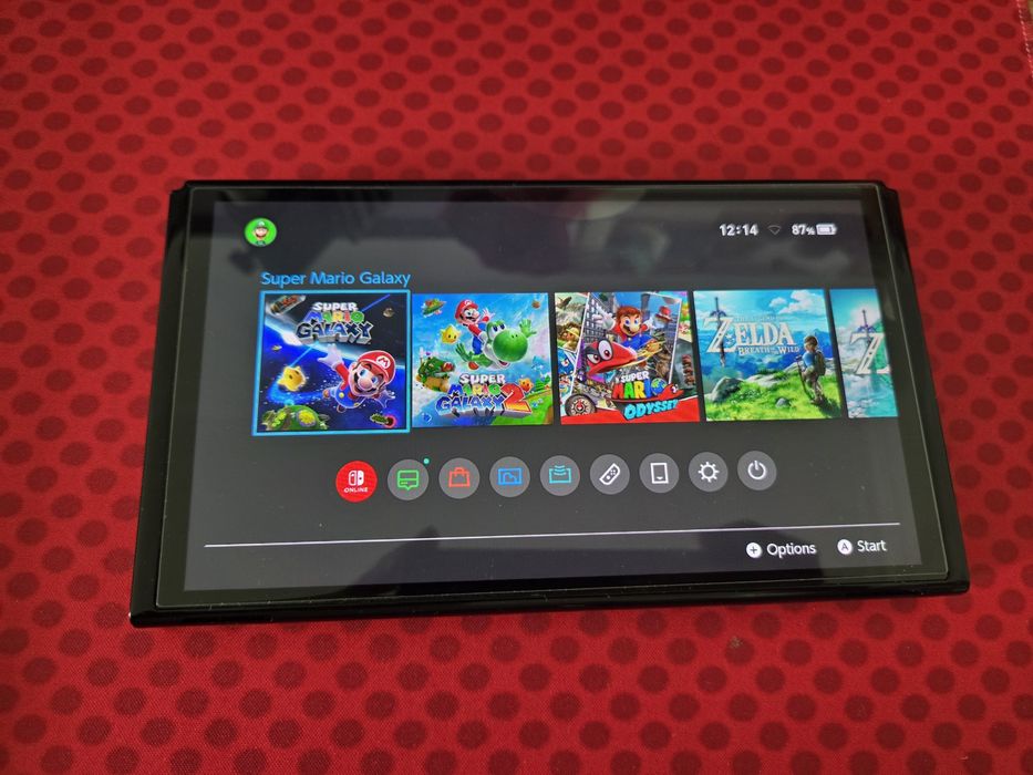 Nintendo Switch OLED desbloqueada 128gb 

Consola pronta a jogar, com