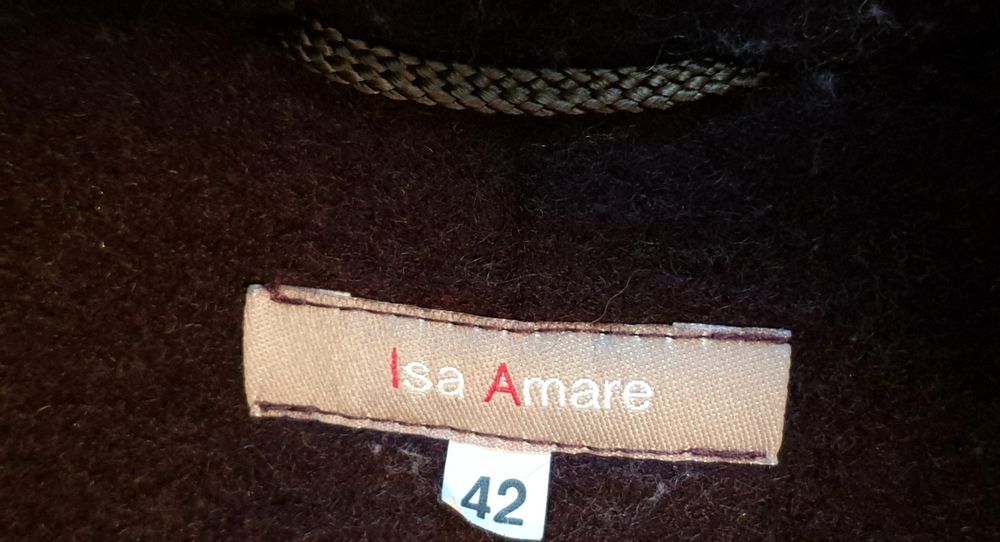 Wełniany płaszcz flauszowy.