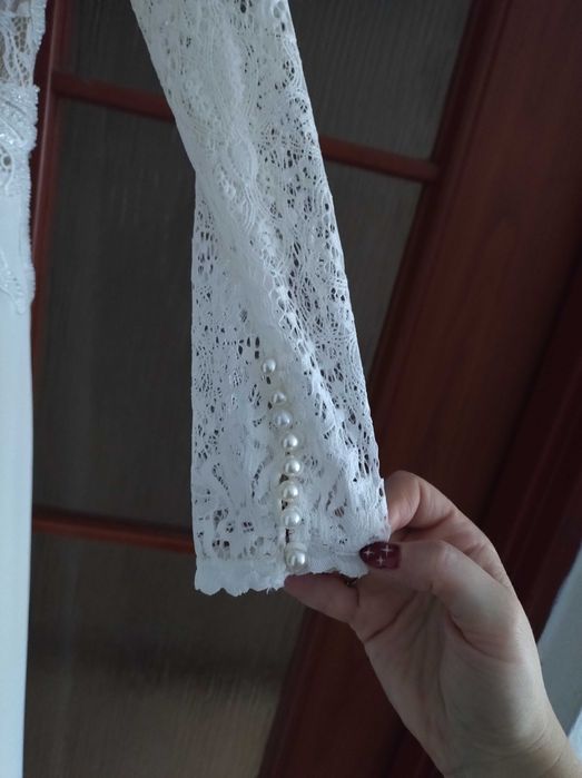 Suknia ślubna z długim rękawem