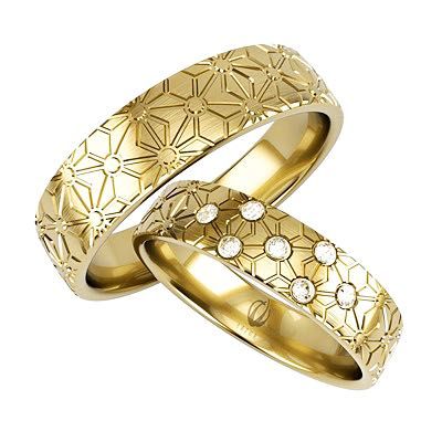 Złote obrączki para nowoczesne zdobione z diamentami brylantami