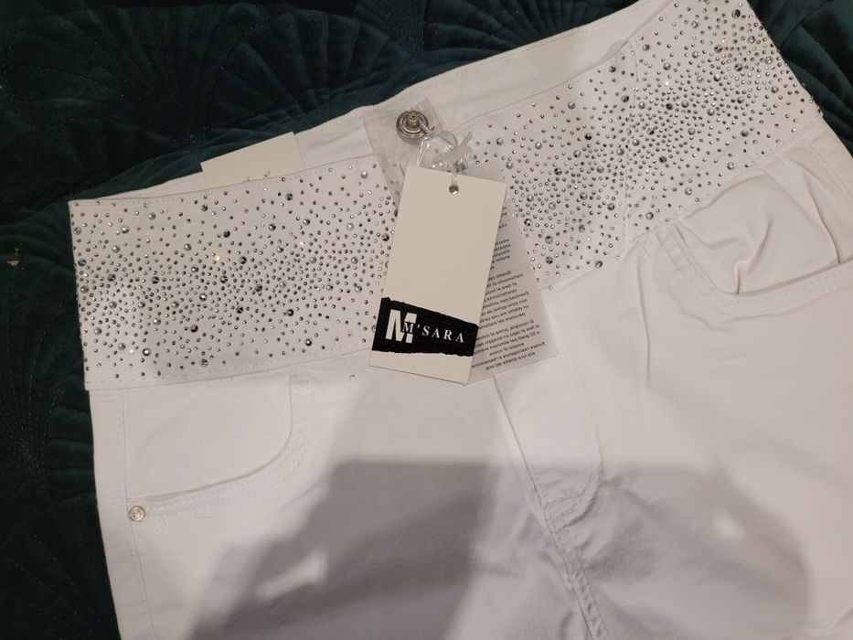 Spodnie damskie białe nowe L