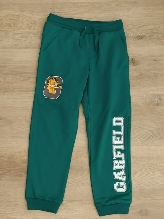 Spodnie dresowe zielone chłopięce Garfield rozmiar 128 cm