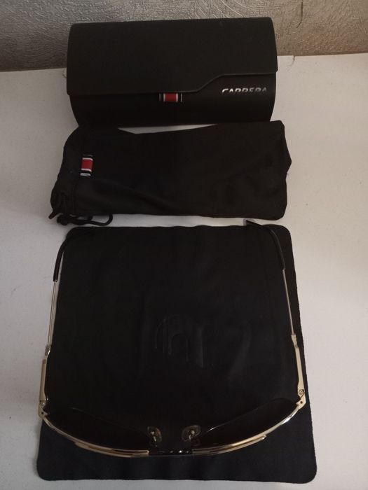 Продаю фирменные солнцезащитные очки Каррера !