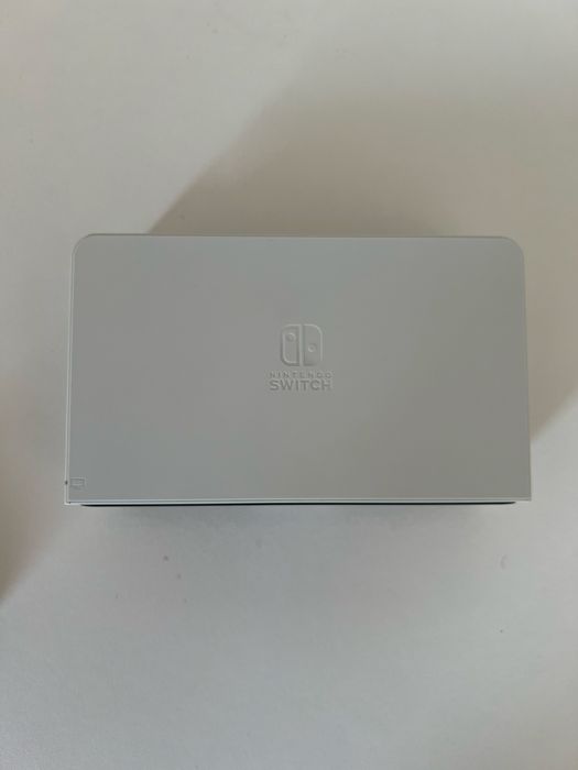 Latest Nintendo Switch model: Nintendo Switch OLED. +2 games