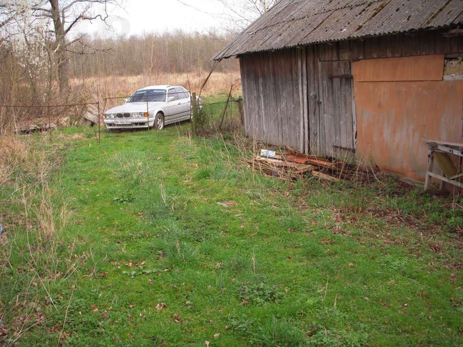 Продам земельну ділянку із старим будинком 48 сот