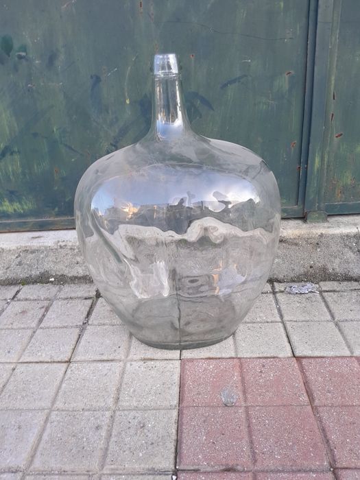 Garrafão  de vidro.