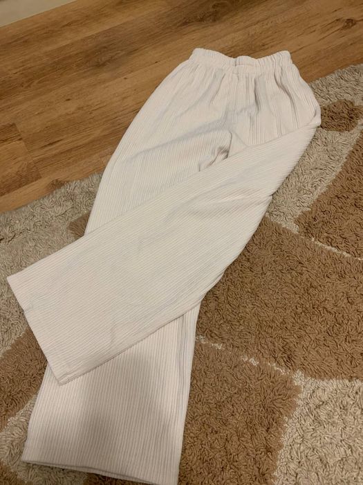 Жіночі штани молочні