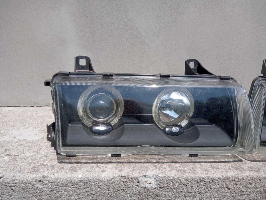 Lampy reflektory soczewki + ringi Hella Celis Black BMW E36 RARYTAS