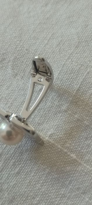 Negócio de oportunidade. Botões de punho Mikimoto