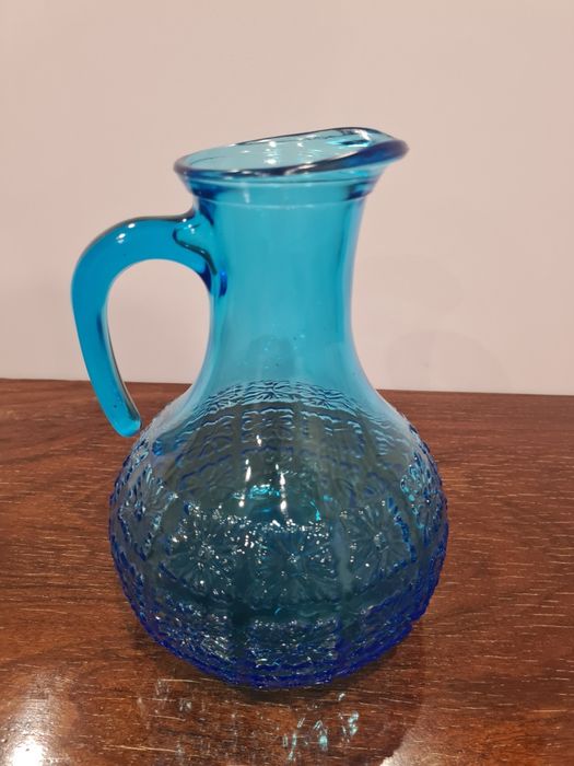 Vintage embossed glass jug
