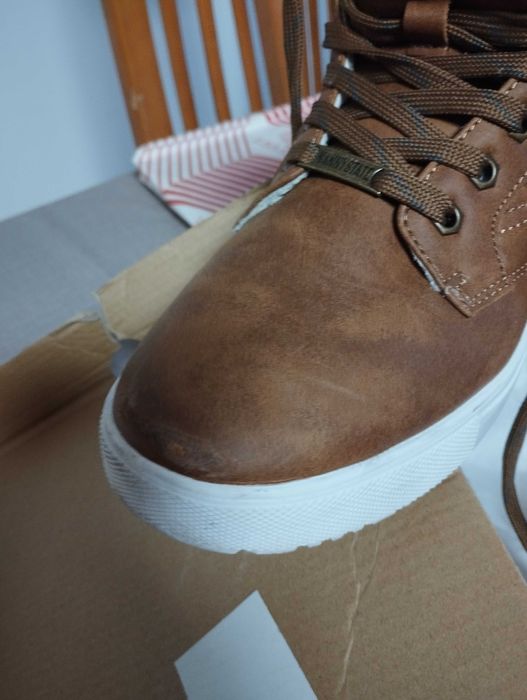 Bota em ótimo estado para rapaz