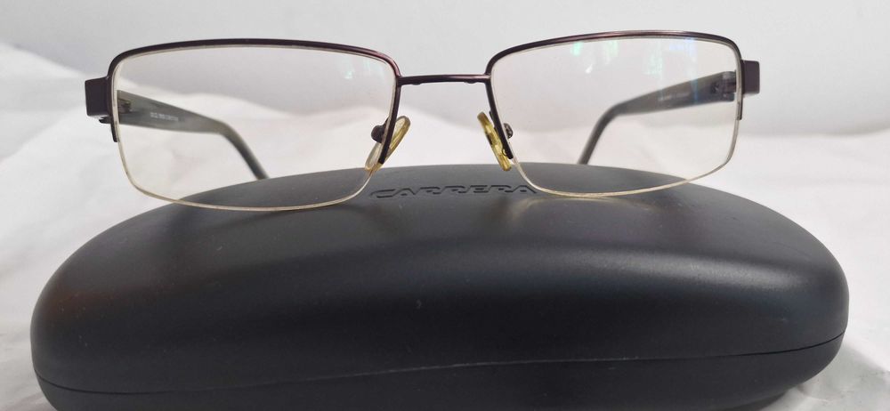 Sprzedam okulary męskie prostokątne Carrera w brązowych oprawkach.