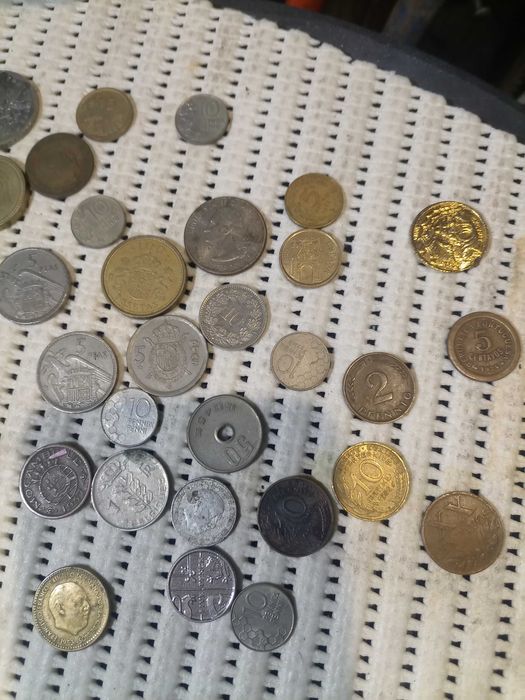 Notas e moedas de colecção