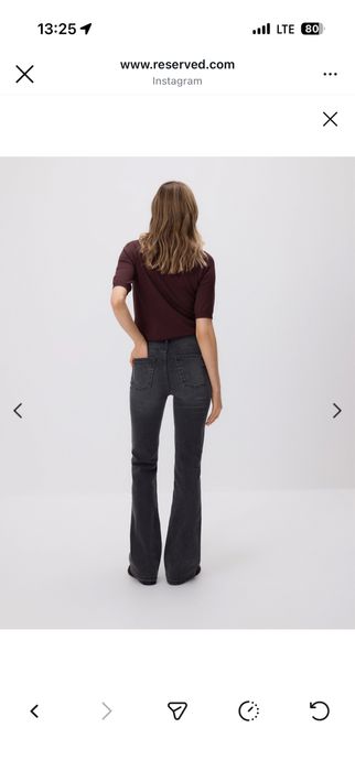 Джинсы reserved клешь от колена