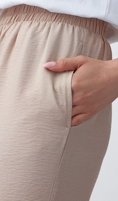 Beżowe letnie spodnie z szerokimi nogawkami 40/42 L/XL