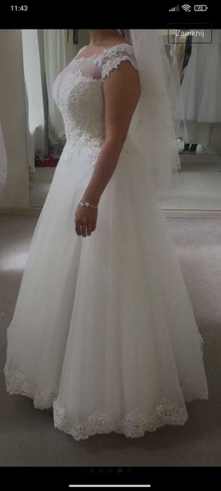 Śmietankowa suknia ślubna