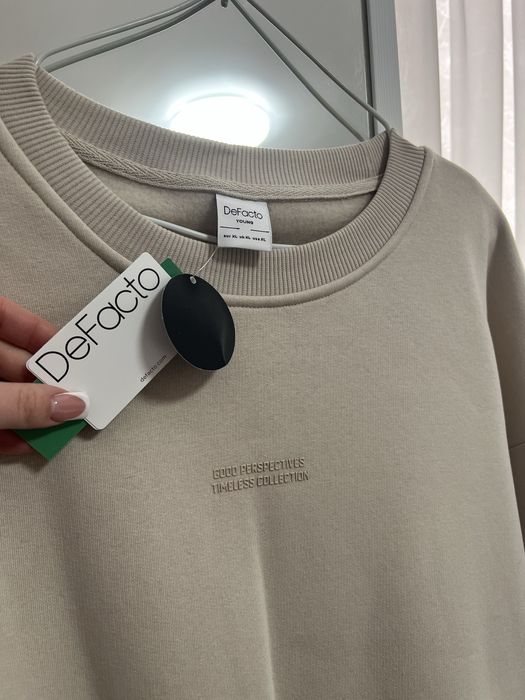 Новий чоловічий бежевий світшот з начосом DeFacto