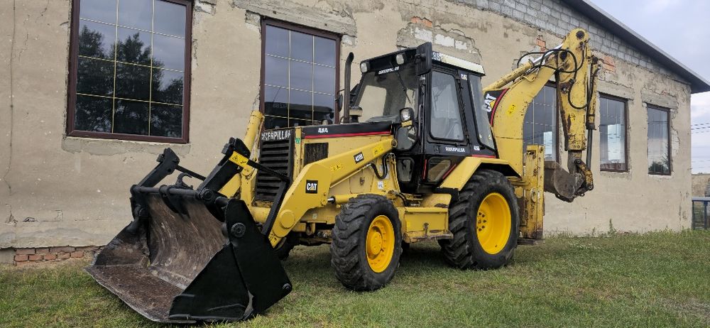 Sprzedam koparko ladowarka caterpillar cat 428b  4x4 pelna opcja