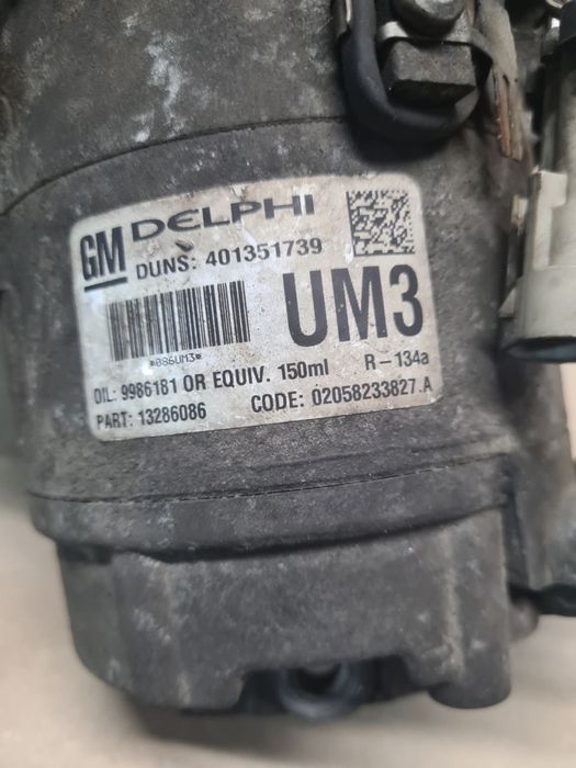Компресор кондиціонера Opel Astra H Meriva Zafira B 1.7 13286086 UM3