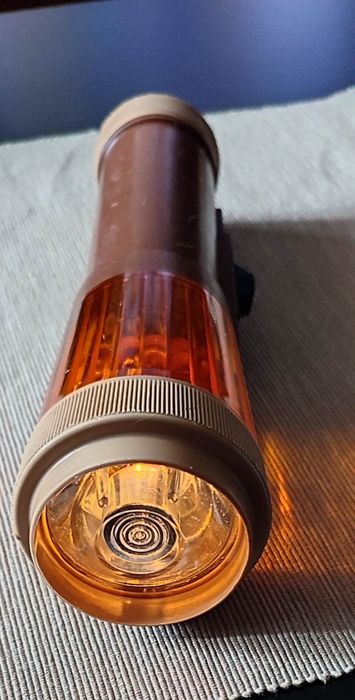 Latarka PRL słoneczko brązowa. Legendy PRL