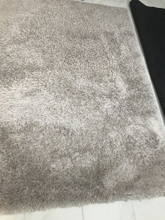 Tapete cinzento como novo