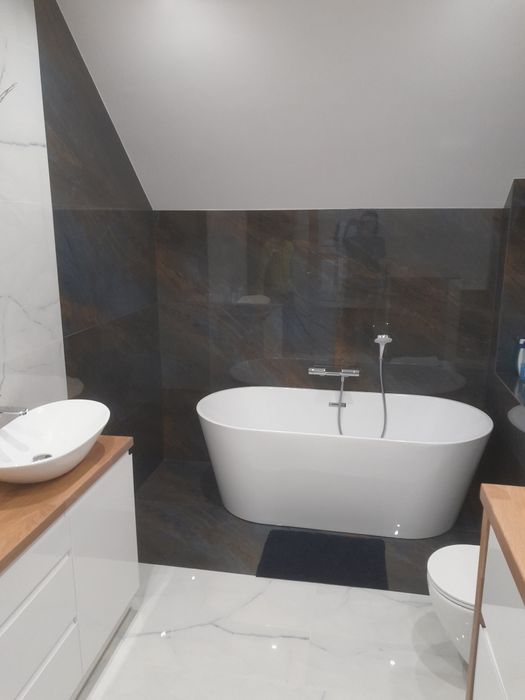 Remonty i wykończenia układanie płytek szpachlowanie malowani