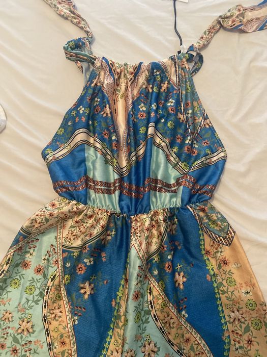 Macacão novo e com etiqueta