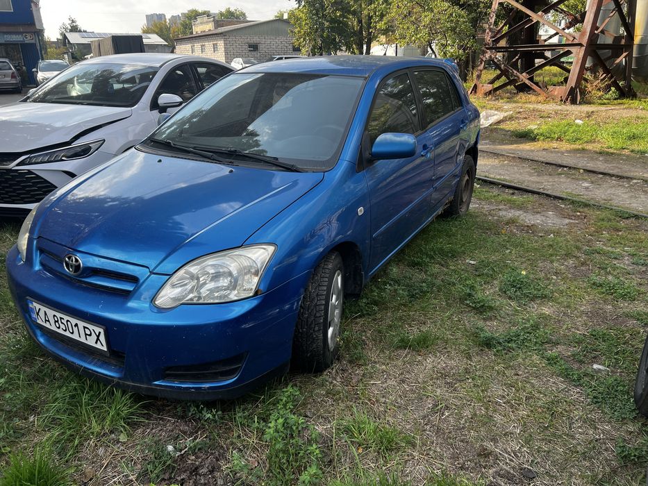 Toyota Corolla 2006 (E120) Рестайлінг • 1.6 Бензин • Надійний хетчбек