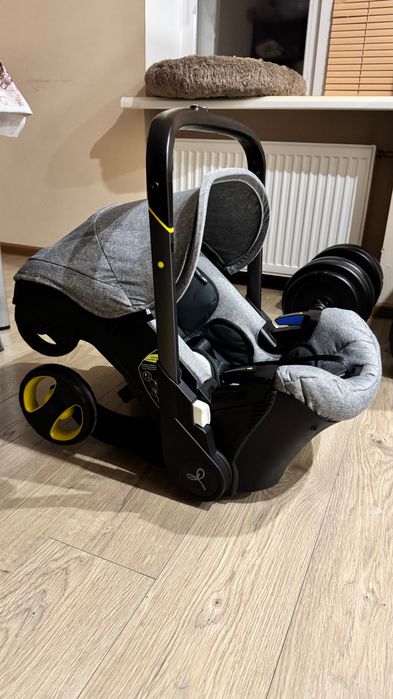 Коляска автокрісло