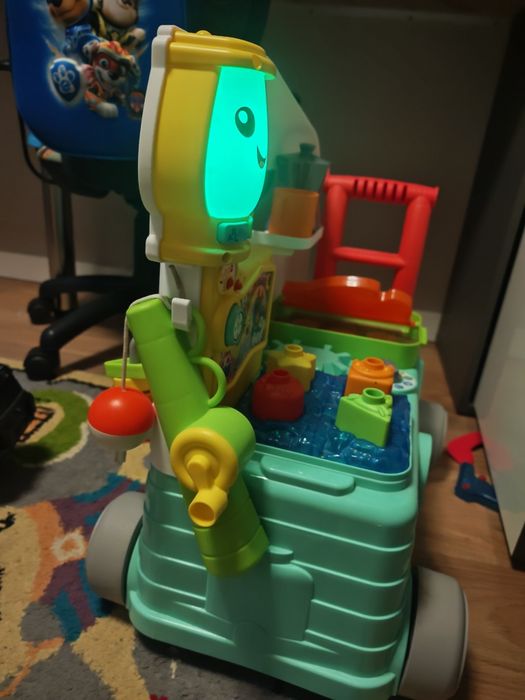 Fisher Price Wesoły Kamper Malucha pchacz jeździk grający