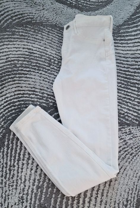 Spodnie jeans "River Island".