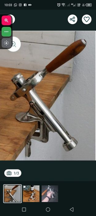 Saca rolhas automático