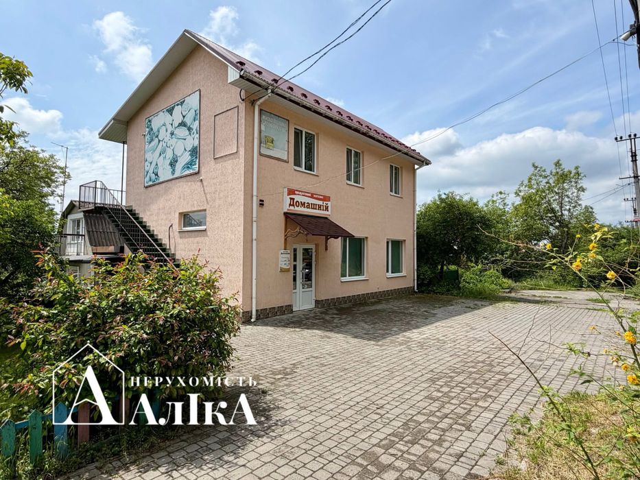 Продам 2-поверхову будівлю з магазином