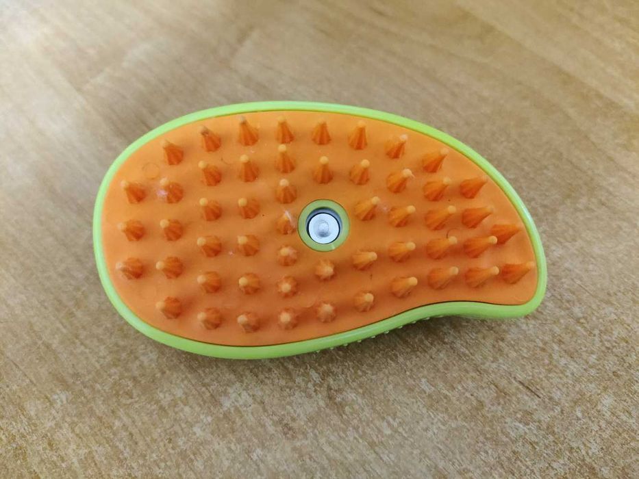 Парова щітка для вичісування шерсті тварин