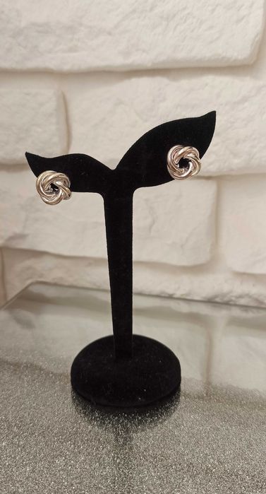 Przeplatane kolczyki kolor srebrny