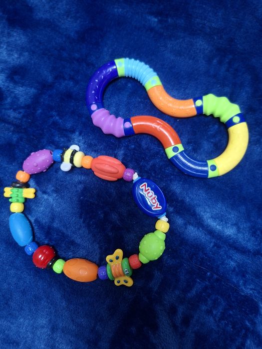 Іграшки м'які на колиску чи кроватку