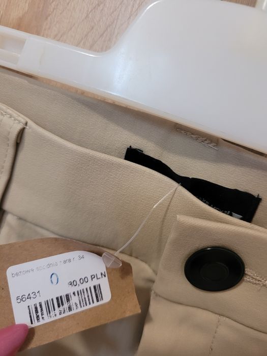 Zara woskowane spodnie beżowe