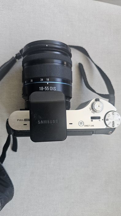 Samsung NX300 + Lente 18-55mm OIS |