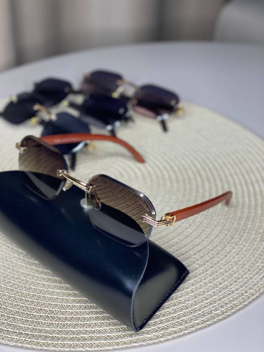 Сонцезахисні окуляри Cartier 7052 безободкові унісекс