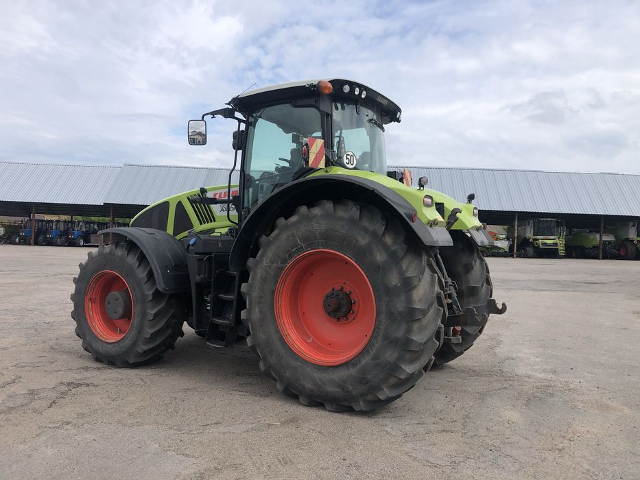 Трактор Claas Axion 950 2014 410 Продаж