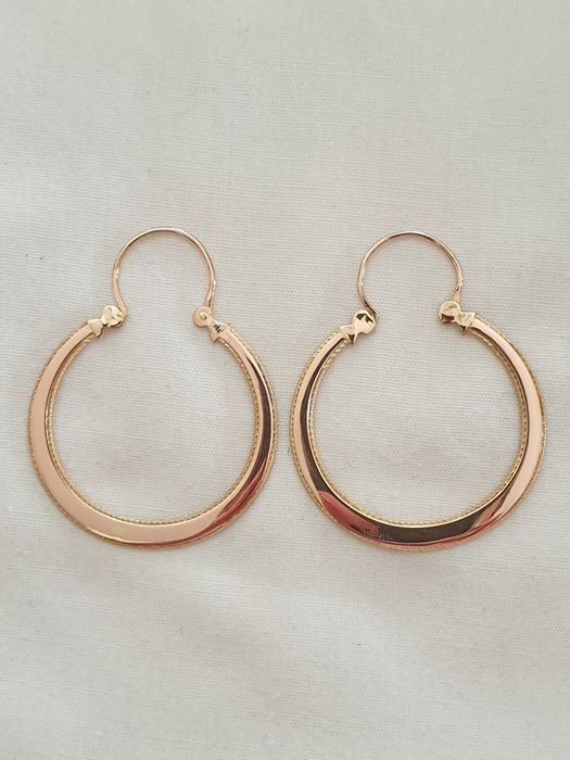 Argolas de ouro grandes