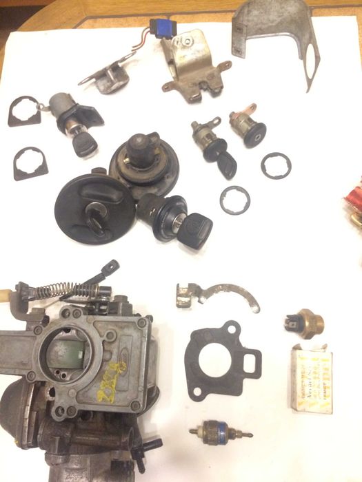 Клапан х/ходакарб Форд, пробка бензобака,замки дверей багажника и друг