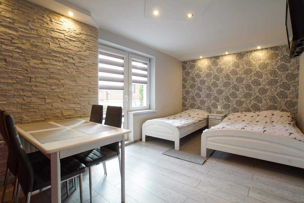 Noclegi w apartamentach/pokojach ,, Pod Łysicą''