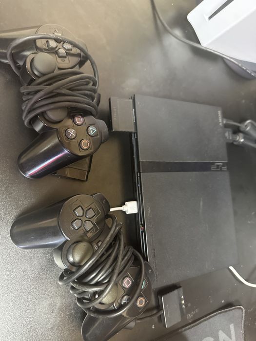 Ps2 Slim + 2 comandos e muitos jogos