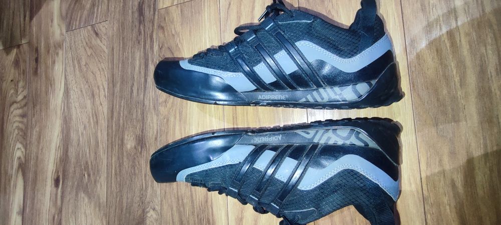 Oryginalne buty Adidas Traxion rozm 42 wkładka na zdjęciu