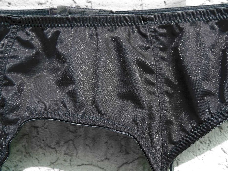 *Hennes & Mauritz* błyszczący srebrem roz 42-48