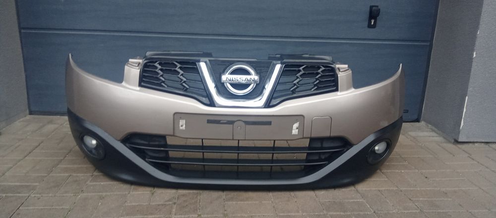 Zderzak przód przedni Nissan Qashqai J10 Lift zderzak grill  halogen