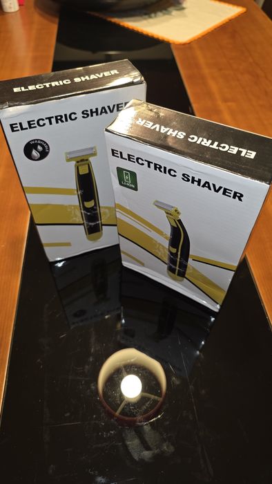 Máquina de barbear e cortar pelos ou cabelo